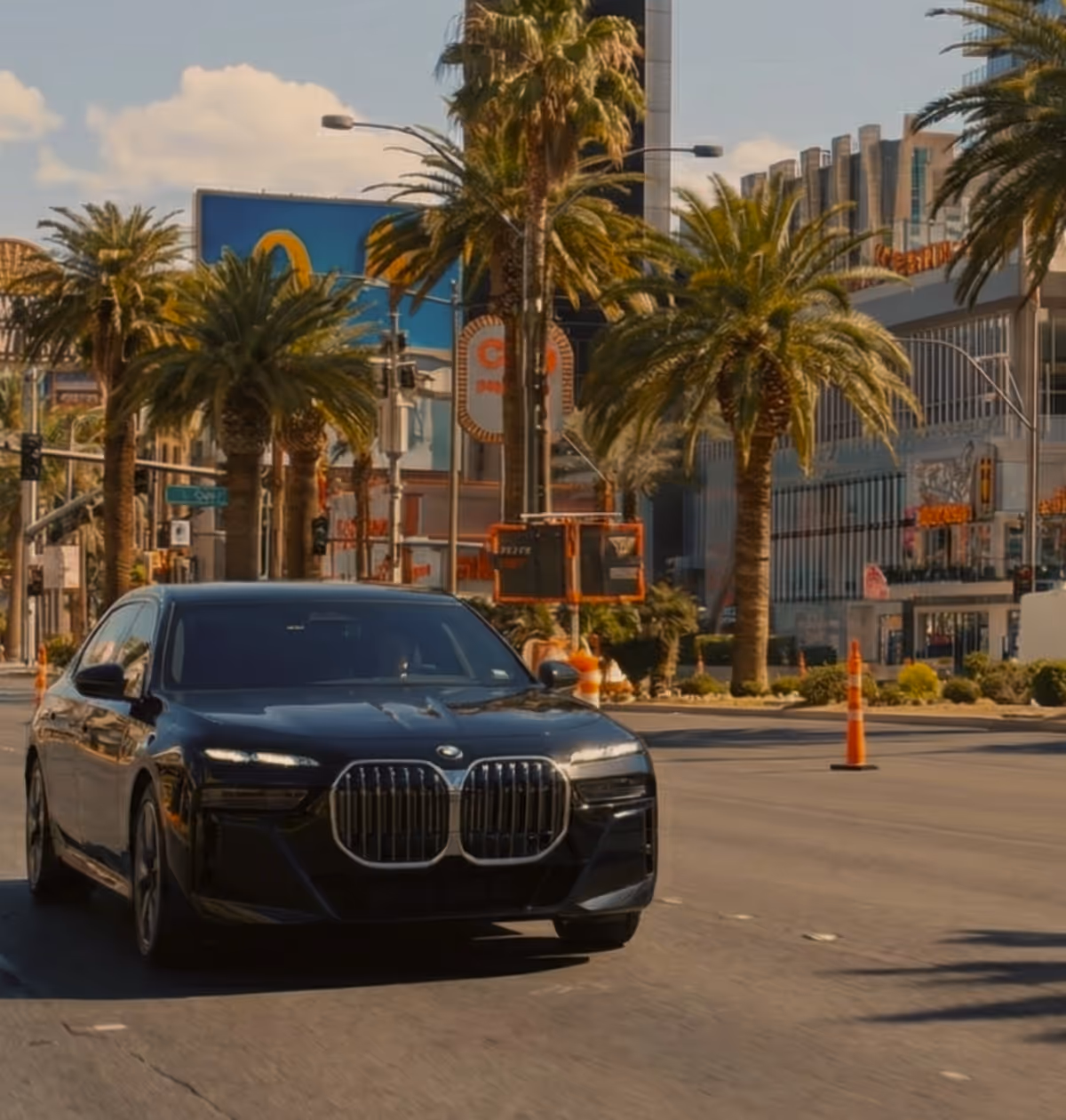 Luxury vehicle parked in a high-end urban setting for flexible "as directed" service.
