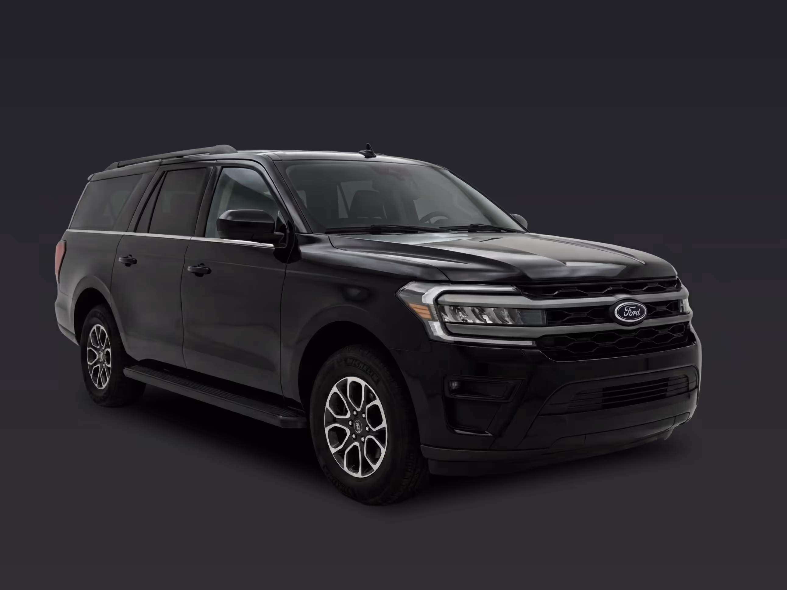 Side view of a premium spacious SUV suitable for group travel.