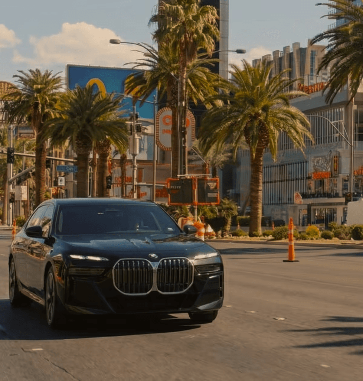 Luxury vehicle parked in a high-end urban setting for flexible "as directed" service.
